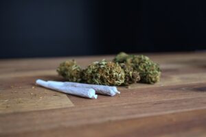 Cannabis and a rolled marijuana joint with Delta 9 THC 