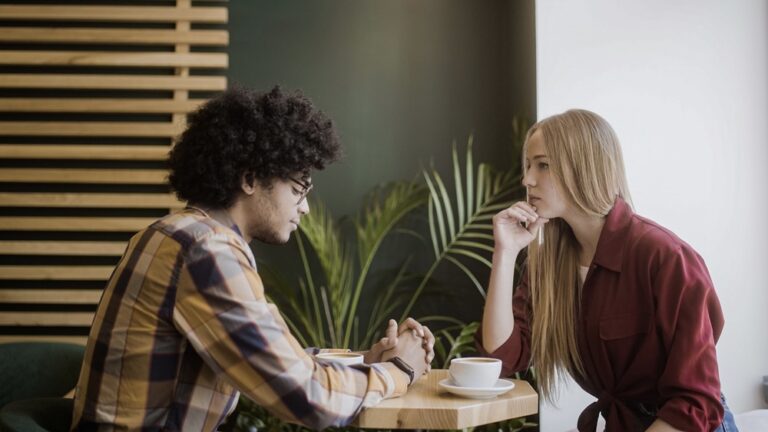 Partners who are dating after rehab in recovery in a restaurant