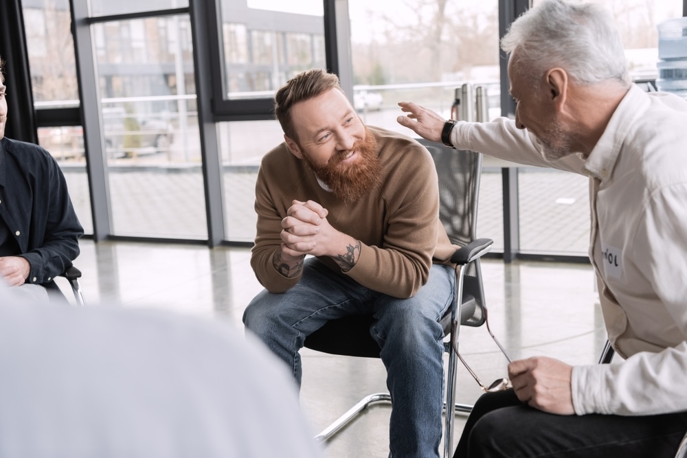 Group therapy session for people in addiction recovery